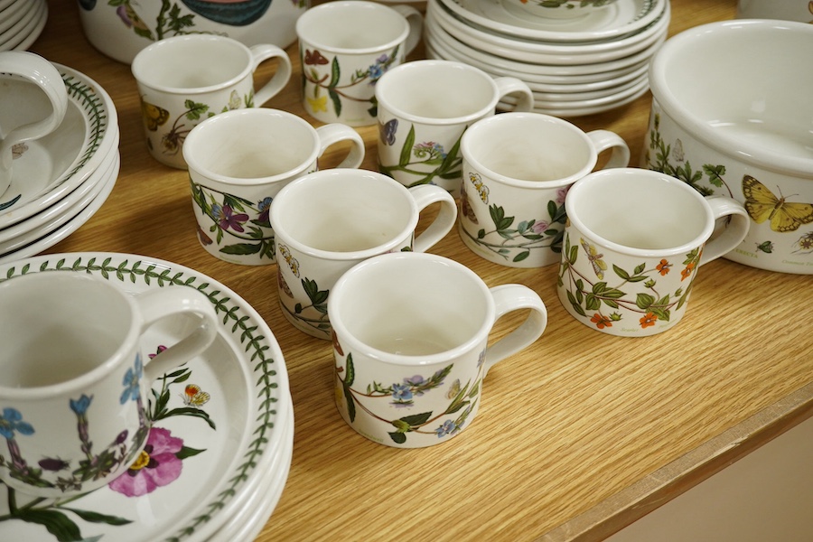 A quantity of Portmeirion tableware to include oval dishes, cups, saucers and dinner plates. Condition - mostly fair, some cracks